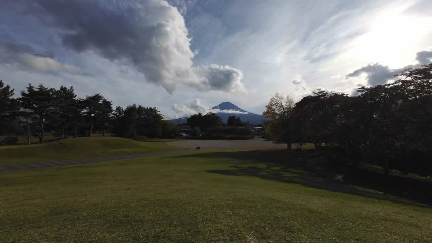 Scenic View of Mount Fuji with Lush Green Park in Japan