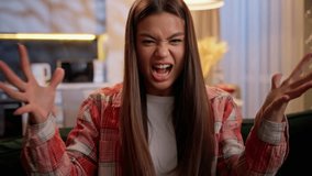 Angry woman shouting at night home mad annoyed crazy young girl teen female screaming problem negative emotions crisis stress anger scream yell at camera complain furious expression quarrel conflict - Powered by Shutterstock - Get 15% off with code: PIKWIZARD15