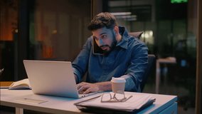 Stressed businessman Indian man guy working in night overtime office Arabian angry frustrated male business entrepreneur dissatisfied talk mobile phone overwork stress problem smartphone call arguing - Powered by Shutterstock - Get 15% off with code: PIKWIZARD15