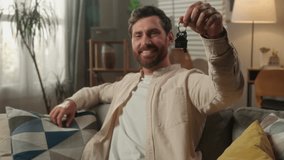 New home Caucasian man holding keys happy guy smiling male homeowner real estate agent house mortgage investment first own apartment buy rent moving day relocation bank credit purchase key apartment - Powered by Shutterstock - Get 15% off with code: PIKWIZARD15