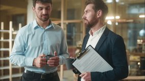 Male friends colleagues co-workers business men Caucasian guys buddies drink coffee together break in office smiling businessmen partners talking discuss news in company chatting friendly conversation - Powered by Shutterstock - Get 15% off with code: PIKWIZARD15