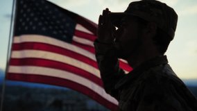 Silhouette Of A Soldier Salutes In Front American Flag At Sunset Memorial Day - Powered by Shutterstock - Get 15% off with code: PIKWIZARD15