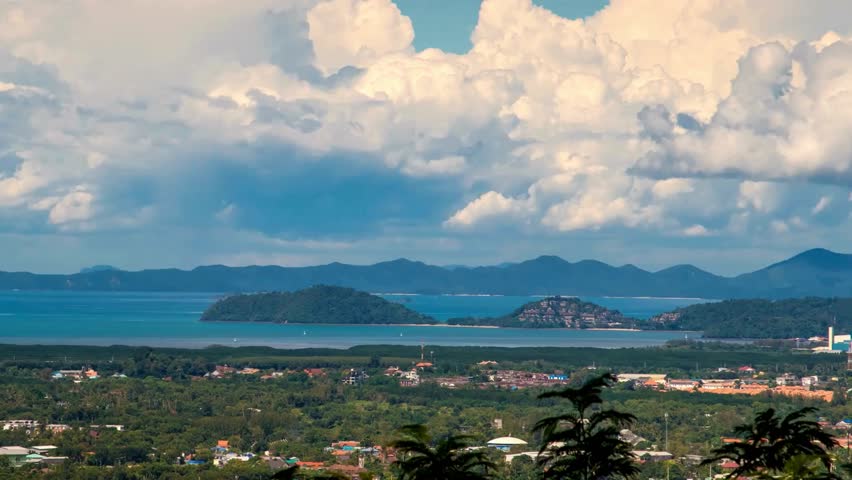 Panoramic View of Coastal Landscape with Islands and Clouds