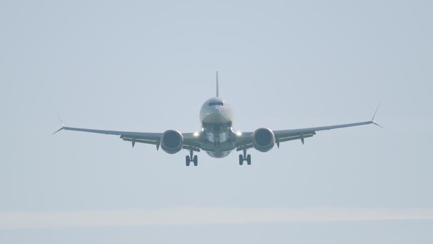 Excitement in the skies as an aircraft gracefully descends towards its dreamy vacation destination