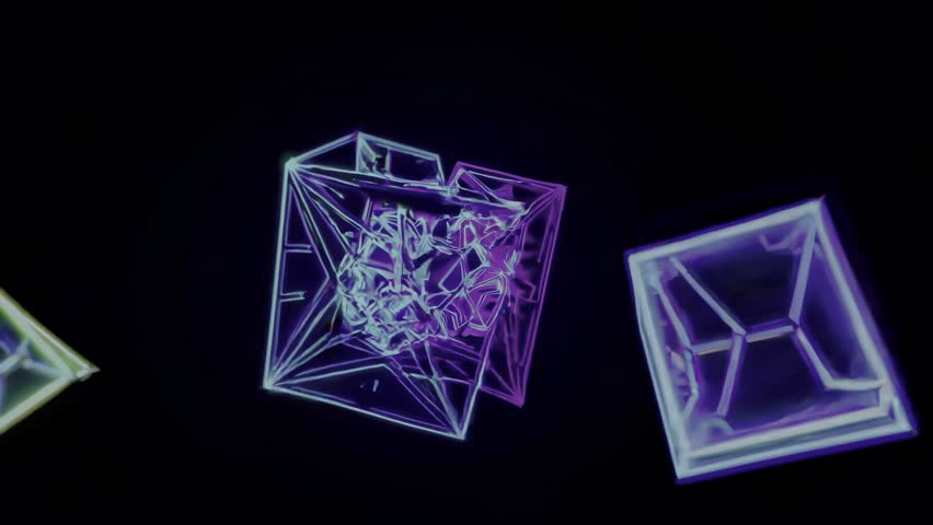 A 4K animation of a glowing neon cube rotating in a dark, futuristic environment. - Powered by Shutterstock - Get 15% off with code: PIKWIZARD15