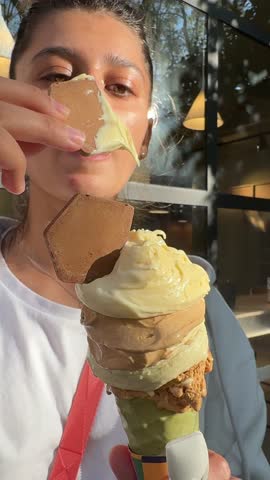 Savoring a Delightful Ice Cream Cone Under the Warm Sun on a Beautiful Day Outdoors