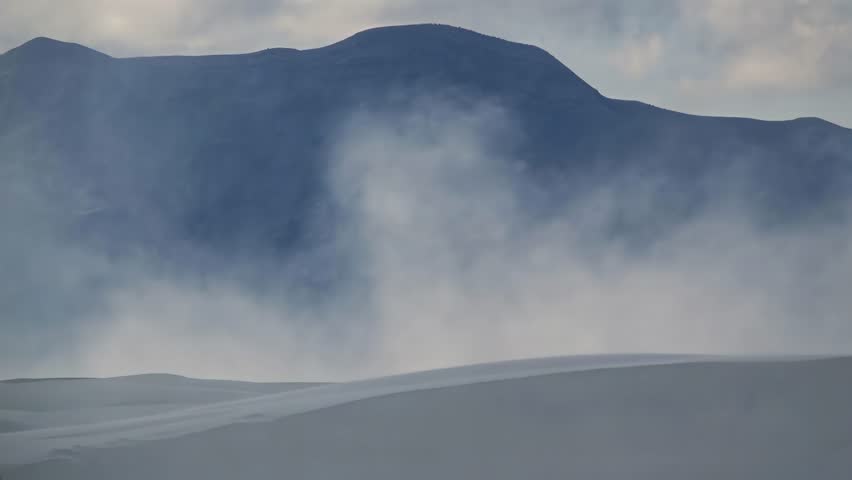 Natural beauty of American desert : time lapse of White Sands, New Mexico. Waves of dunes and massive clouds of sand blown.