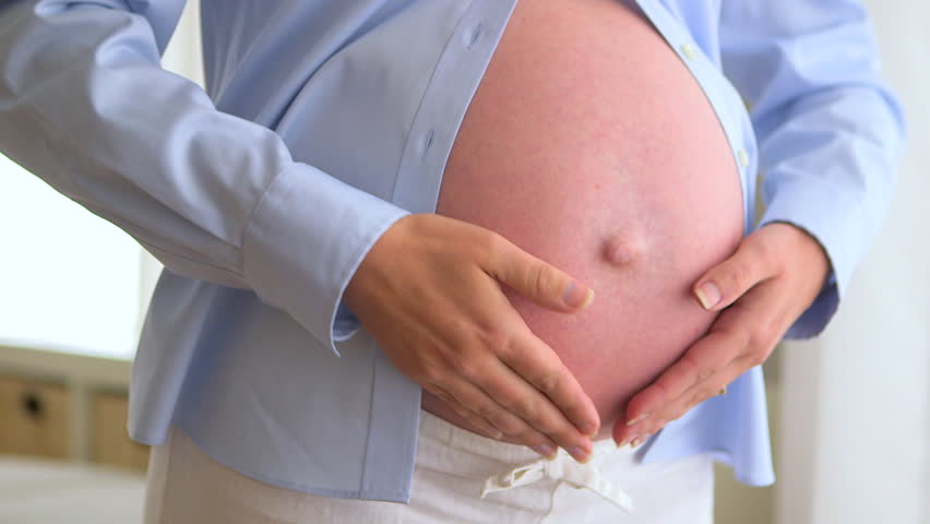 Pregnant Mother Rubbing Stomach Stock Footage Video (100% Royalty-free
