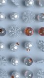 Christmas rotating balls and snowflakes on blue background. New Year decorative pattern. Seamless looped 4k vertical animation. - Powered by Shutterstock - Get 15% off with code: PIKWIZARD15