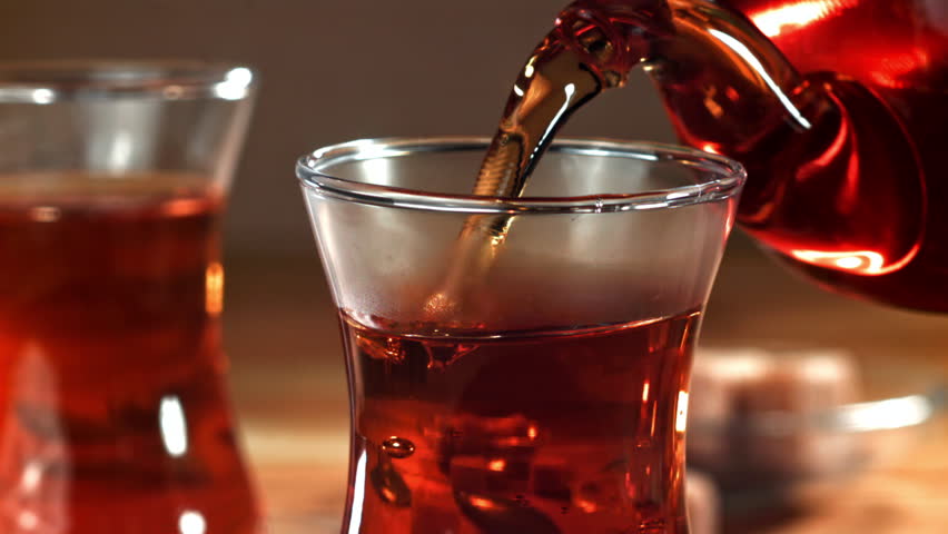 Turkish tea is poured into a glass. Filmed on a high-speed camera at 1000 fps. High quality FullHD footage