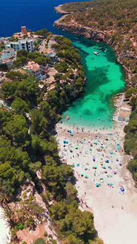 Aerial view of the Bay of Cala Pi in Mallorca, Balearic Islands, Spain. Stunning Mediterranean Sea coast with turquoise water sea bay and white sand beach. Mallorca travel destinations