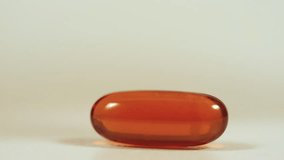 Close-up of a red pill on a neutral background. - Powered by Shutterstock - Get 15% off with code: PIKWIZARD15