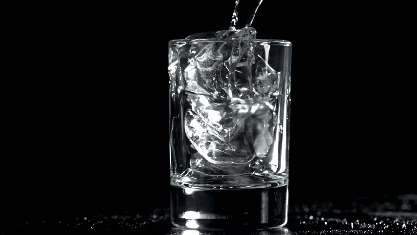 Vodka with ice. Filmed on a high-speed camera at 1000 fps. High quality FullHD footage