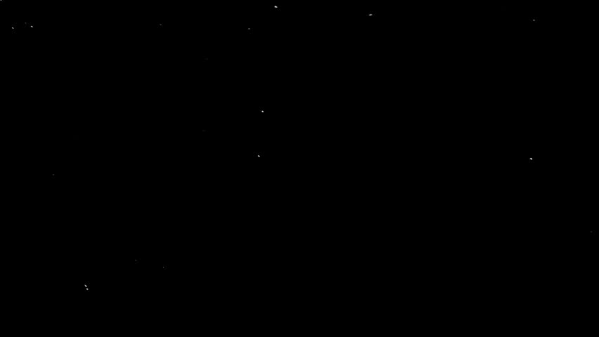 Old film effect showing dust and scratches on black background