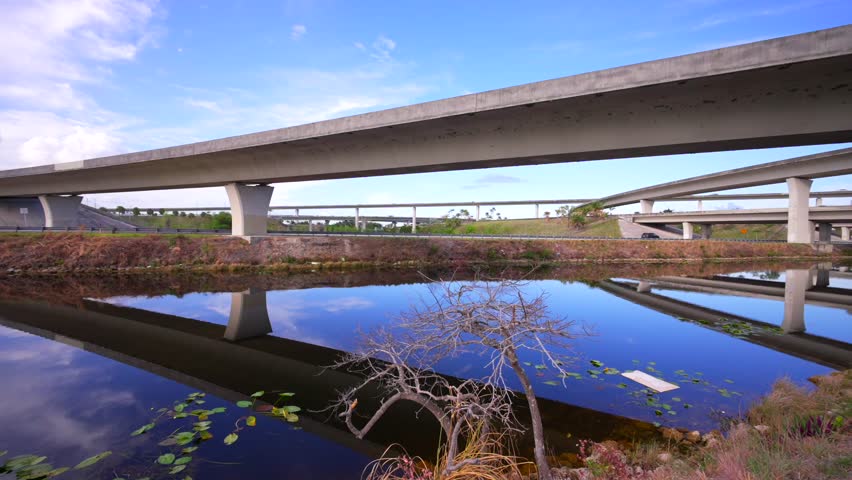 Fort Lauderdale Florida. Panning video of the New River Greenway with highway overpass