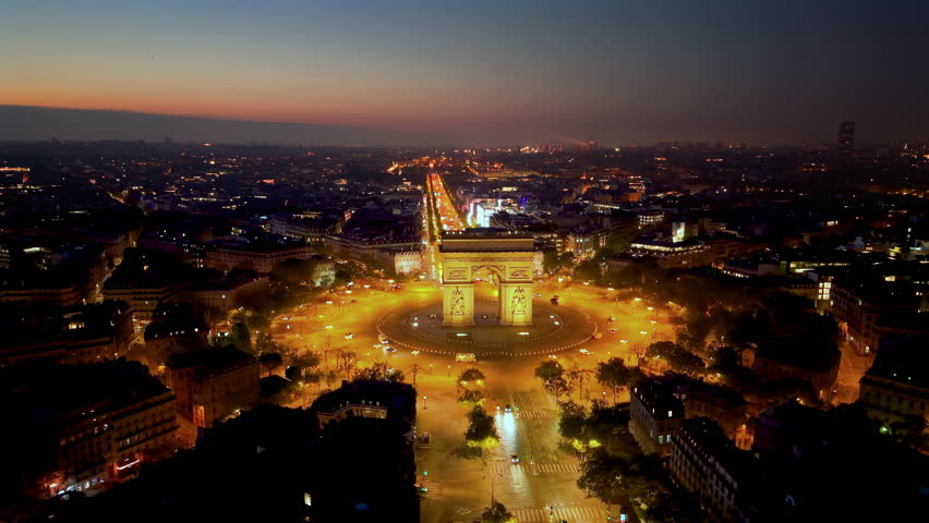 Stunning Aerial View of the Iconic Arc de Triomphe Monument at Beautiful Sunset Time. 4k. France