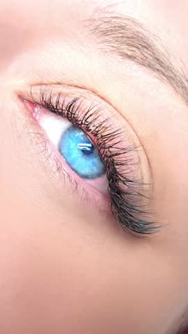 Close up of eye with eyelash extensions ,beauty salon treatment ,2d volume, 3d volume, classical lashes,Russian volume,megavolume, new set.