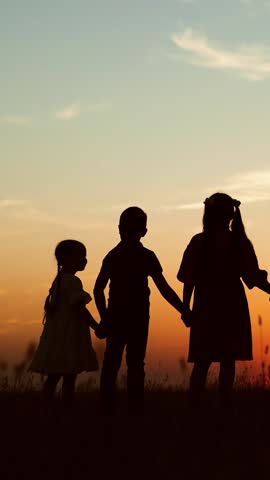 Happy family, silhouettes at sunset. Big family kids childs siblings parents holding hands appreciating enjoying orange setting sun together by car. Closeness family bonds joint recreation at nature