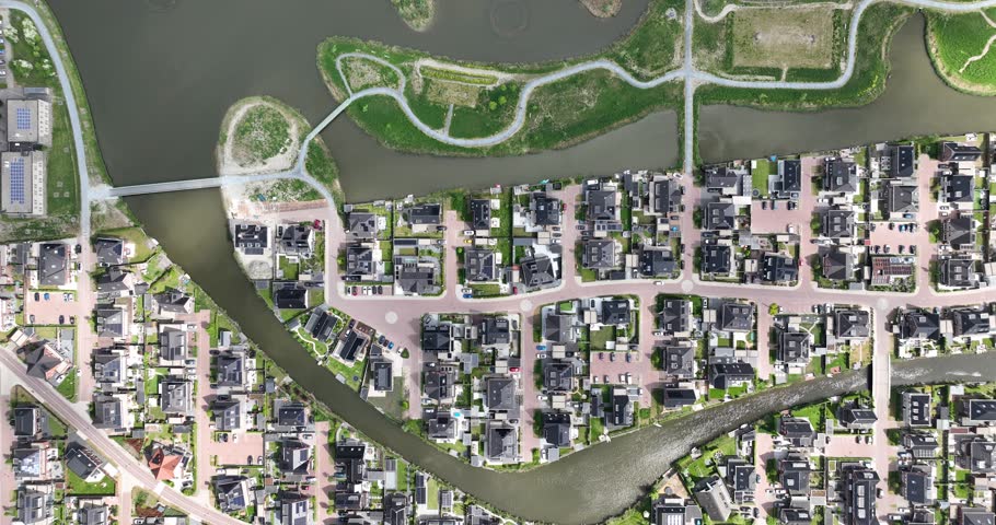 modern build residential area, urban planning, suburban reseidential, villas, free standing houses, modern build housing. Aerial video, the Netherlands.