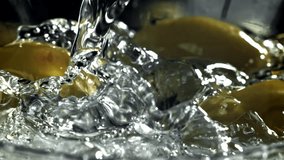 Martini is poured into a glass with ice and olives. Filmed on a high-speed camera at 1000 fps. High quality FullHD footage - Powered by Shutterstock - Get 15% off with code: PIKWIZARD15