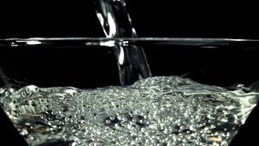 Martini is poured into a glass. Filmed on a high-speed camera at 1000 fps. High quality FullHD footage - Powered by Shutterstock - Get 15% off with code: PIKWIZARD15
