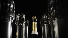 A bottle of champagne is surrounded by other bottles - Powered by Shutterstock - Get 15% off with code: PIKWIZARD15