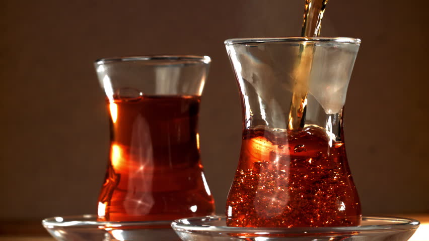 Turkish tea is poured into a glass. Filmed on a high-speed camera at 1000 fps. High quality FullHD footage