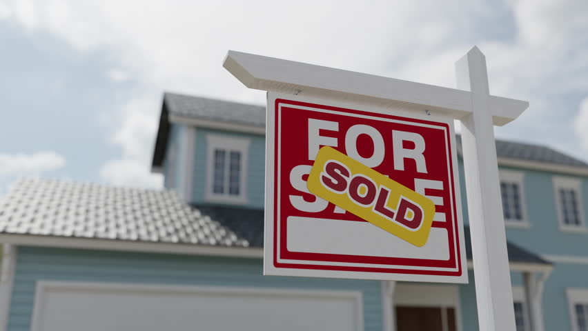 Pan and Zoom of Sold For Sale Real Estate Sign in Front of New House.