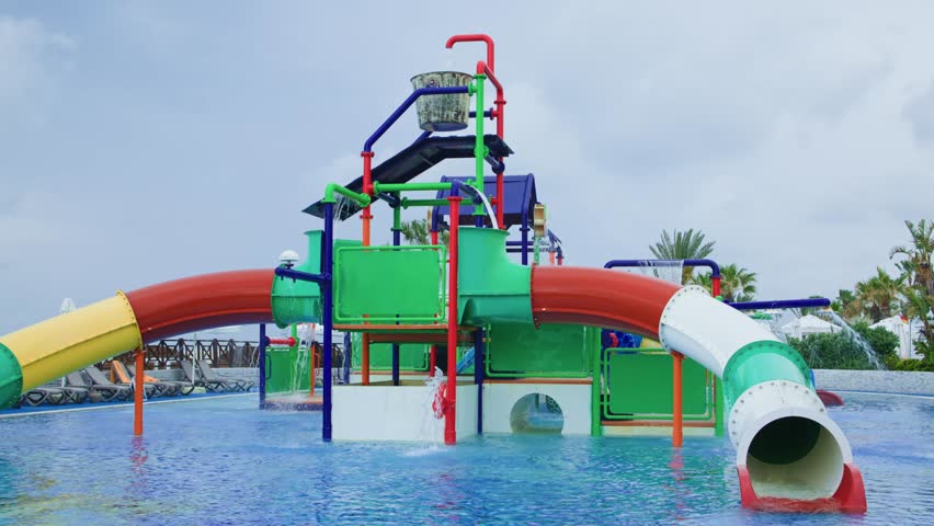 A vibrant water play area with colorful slides and activities for children to enjoy for a memorable experience