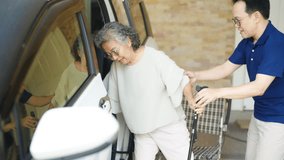 Asian man caregiver helping senior female patient get in car go to medical hospital clinic for doctor appointment healthcare therapy treatment. Retired elderly people transportation assisted service. - Powered by Shutterstock - Get 15% off with code: PIKWIZARD15