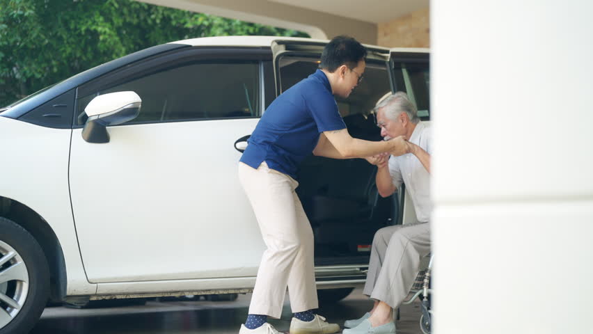 Male caregiver help senior man get in car go to medical hospital clinic for healthcare therapy treatment or doctor appointment. Elderly people transportation assistance service and health insurance. - Powered by Shutterstock - Get 15% off with code: PIKWIZARD15