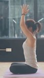 Vertical Screen : Young Asian sporty attractive people practicing yoga lesson with instructor. Asia group of women exercising healthy lifestyle in fitness studio. Sport activity ballet dancing class. - Powered by Shutterstock - Get 15% off with code: PIKWIZARD15