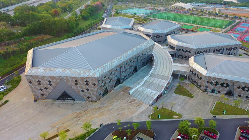 Live coverage of sports activities at Guangxi Liuzhou Liudong Sports Center featuring multiple outdoor facilities