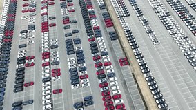 The overflow of vehicles from production lines into a vast parking lot, a critical component in the automotive manufacturing and inventory management process.
 - Powered by Shutterstock - Get 15% off with code: PIKWIZARD15