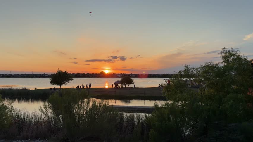 1 Golden Sunset at Lake Pflugerville with Silhouettes and Calm Water
