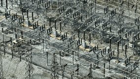 Detailed aerial shot of electrical power equipment used for transforming and distributing electricity, ensuring efficient transmission across regions.
 - Powered by Shutterstock - Get 15% off with code: PIKWIZARD15