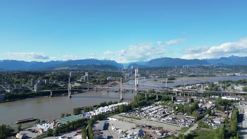 Surrey BC, new westminster, patullo bridge, and fraser river drone aerial on summer morning