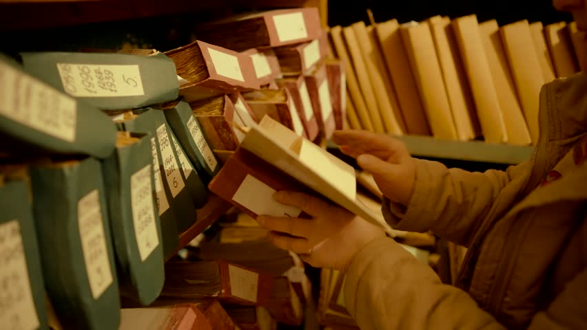Old Document In Archive Department. Archival Material. Bookkeeping File Shelf. 
Archive Texts In Films And Reports. Highly Classified Documents. National Archives Records. Old Secret Archival Document