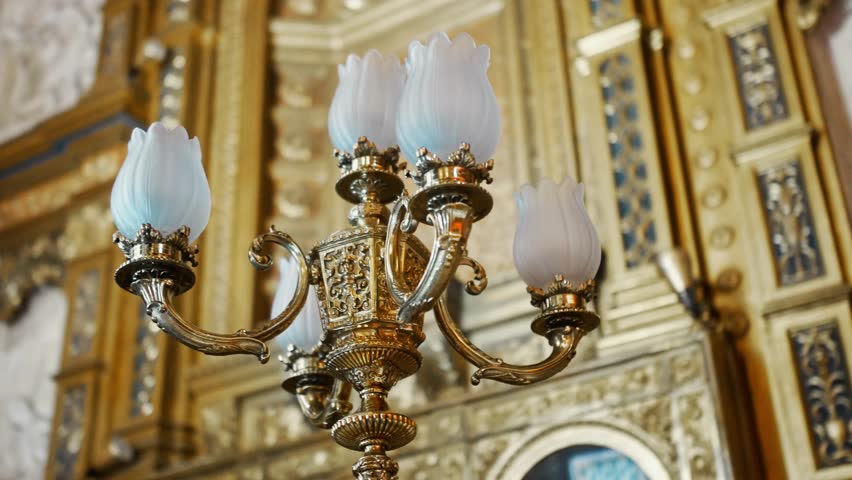Close up of antique candelabrum inside la almudena cathedral in madrid.