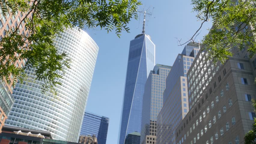 New York City Manhattan, Downtown Financial District architecture, United States. One World Trade Center skyscraper building, USA. American urban street. Freedom tower in NYC. Battery park. Brookfield