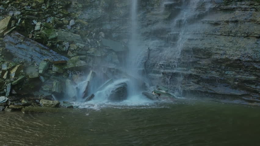 Majestic waterfall cascading over rocky terrain in Hamilton, Ontario, Canada