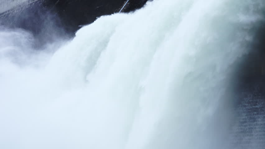 Hydroelectric dam Floodgate with flowing water through gate and Open the springway Khun Dan Prakan Chon Dam in nakhon nayok Thailand