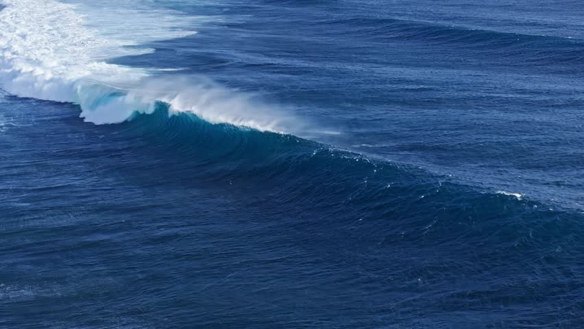 Massive ocean wave breaking, perfect for big wave surf or wind sports in Mauritius