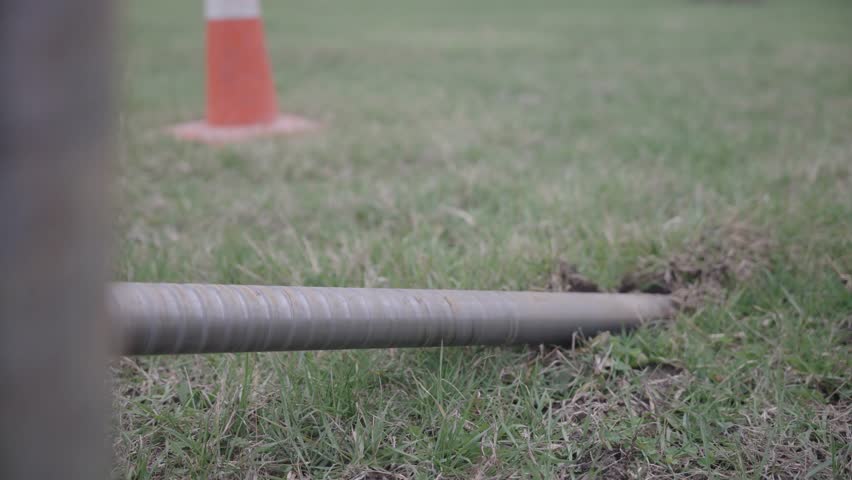 Spinning dig head on a fiber line ditch witch laying cable on a job site