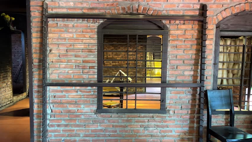 Hoi An silk production starting from the cocoon of caterpillar larvae on mulberry leaves ending with machines and finished products. machines wooden machines stretch silk threads no people fabrics