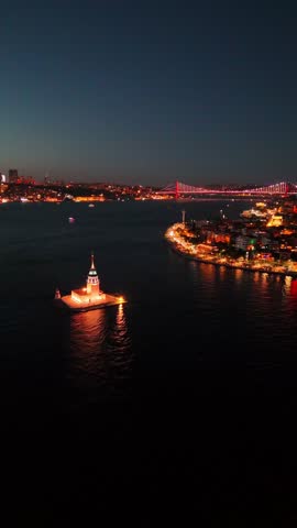 Illuminated Maiden's Tower at Night 4K ultrahd video, Istanbul. An aerial view of the illuminated Kiz Kulesi (Leander's Tower) at night in Istanbul, Turkey. Bosphorus, Uskudar Turkiye holiday tourism