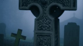 Eerie Graveyard in thick fog and mist medium zoom shot selective focus - Powered by Shutterstock - Get 15% off with code: PIKWIZARD15