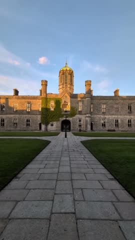 The University of Galway at sunset, quadrangle in Ireland, historical architecture and landmarks background