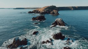 Rocky Outcrops With Waves Crashing Near Cape Kiritappu In Hamanaka, Hokkaido, Japan. wide drone shot - Powered by Shutterstock - Get 15% off with code: PIKWIZARD15