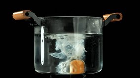 Cooking poached eggs. Filmed on a high-speed camera at 1000 fps. High quality FullHD footage - Powered by Shutterstock - Get 15% off with code: PIKWIZARD15